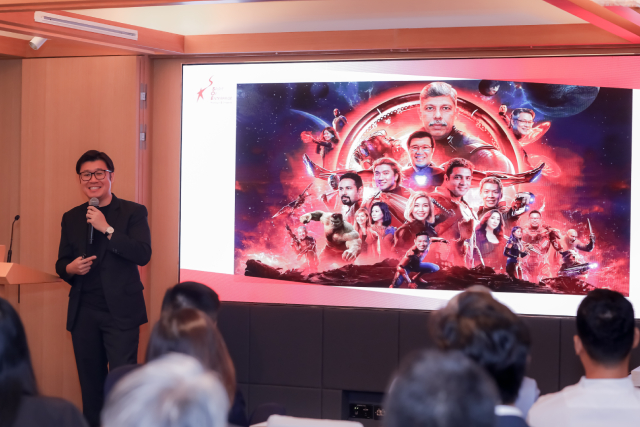 Mr Alan Koh brings the room together with storytelling`